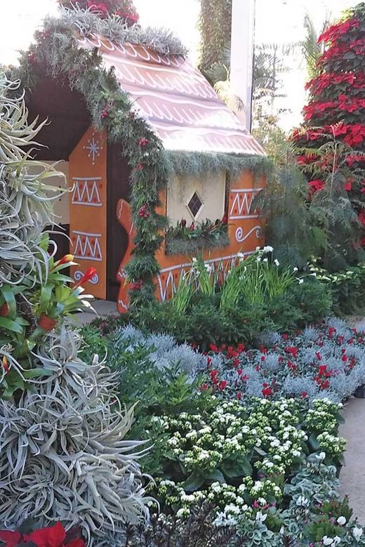 Gingerbread house and bromeliad tree in The Glasshouse